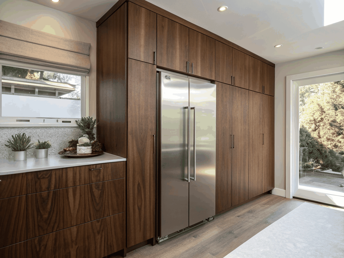 Executive home office with custom built-in desk and cabinetry