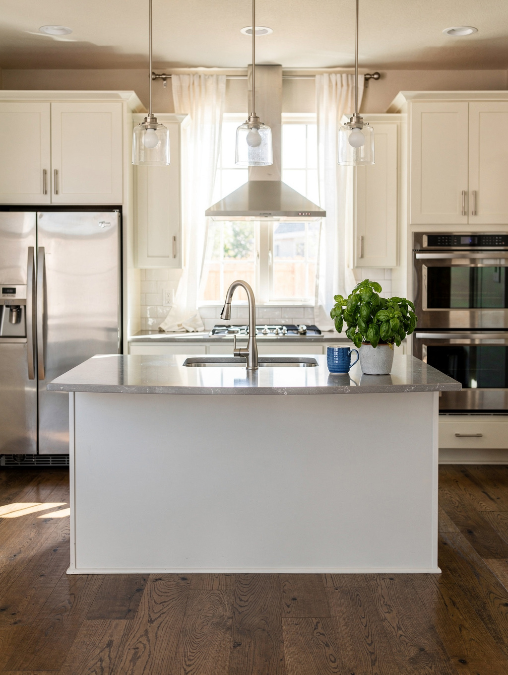 Timeless white shaker kitchen cabinets with crown molding