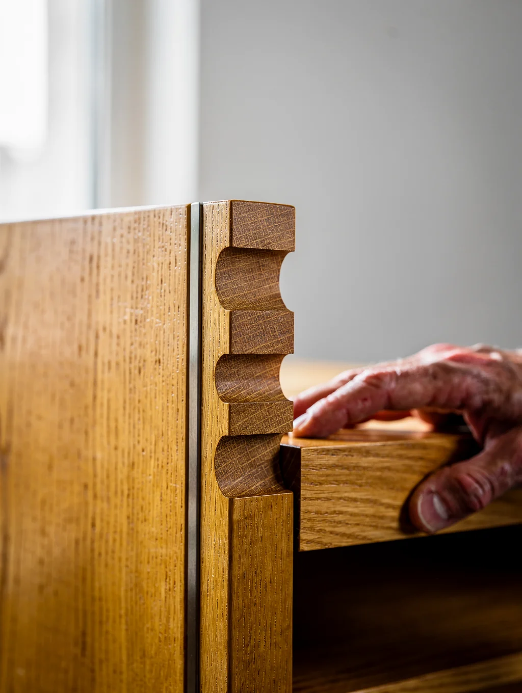 Close up of premium custom cabinet joinery in a professional woodshop