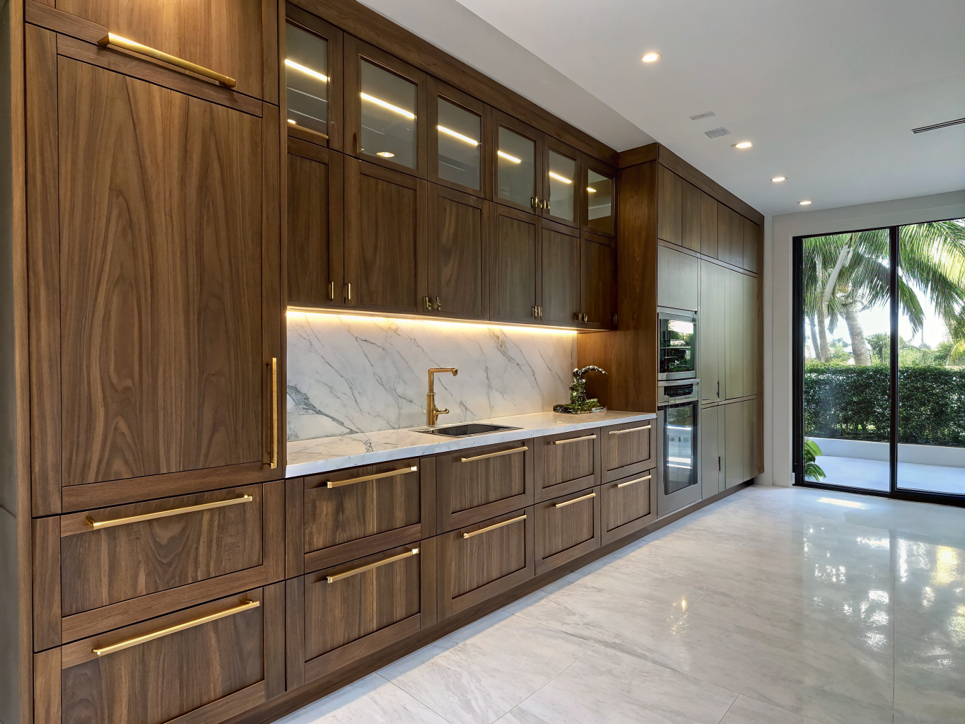 Custom walnut kitchen cabinets with modern hardware